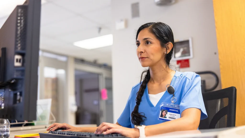 Nurses and doctors managing the central hospital lobby in an ICU wing