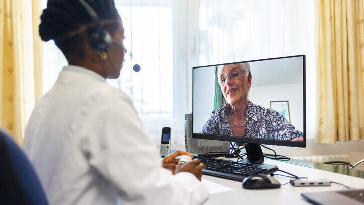Female doctor meeting a patient online.